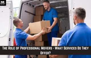 Three movers in blue uniforms load cardboard boxes into a white van. Text reads, The Role of Professional Movers - What Services Do They Offer?.