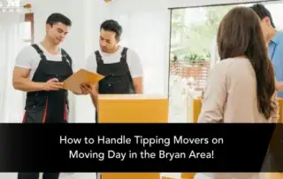 Two young men in black uniforms discussing moving plans with a woman at a moving site.